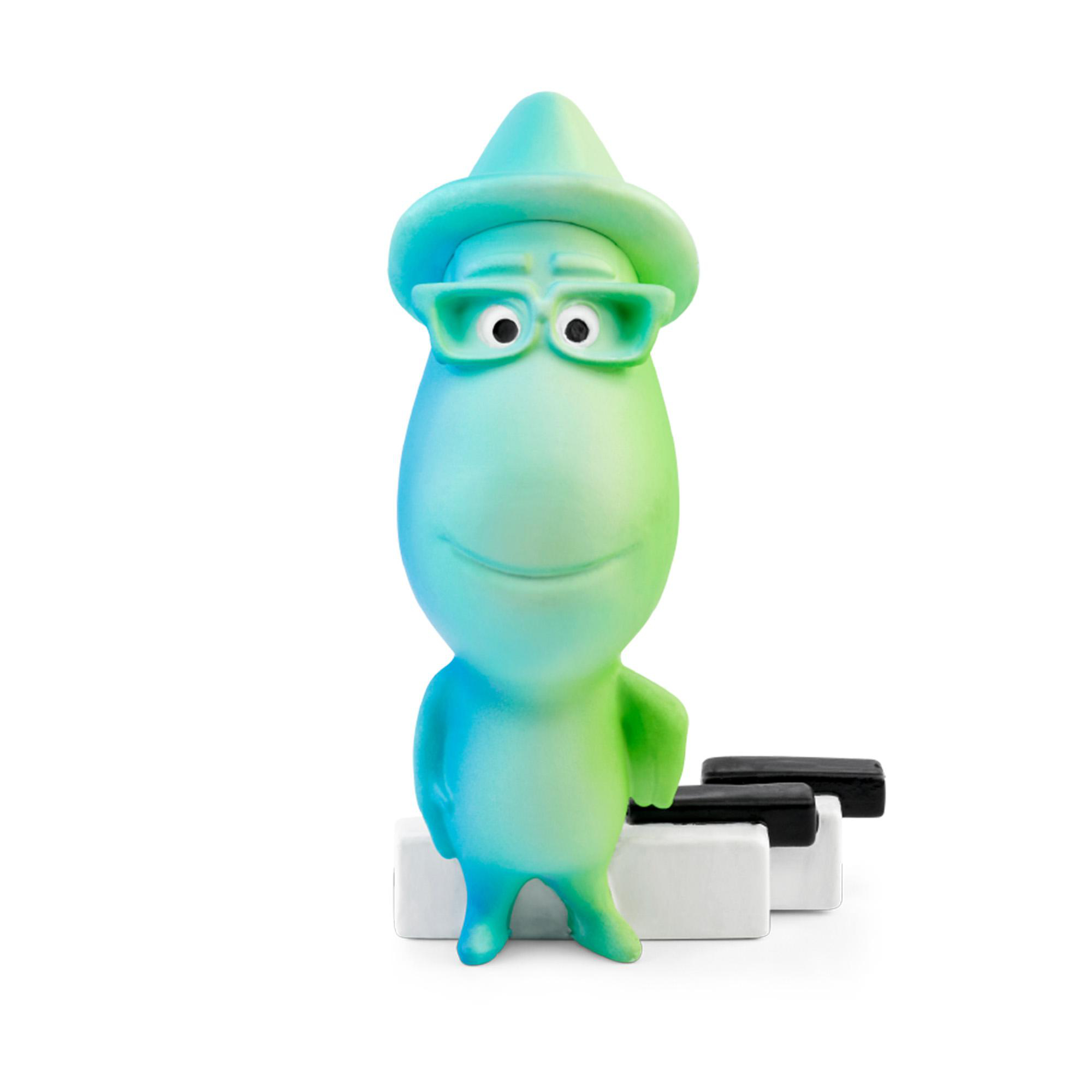 Eine Soul-Figur mit Brille und Hut, die neben einer Klaviatur steht.