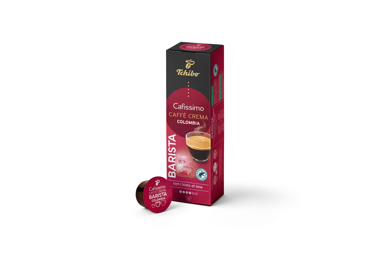 Pudełko i kapsułka do kawy. Pudełko jest czerwone i ma obraz filiżanki kawy.