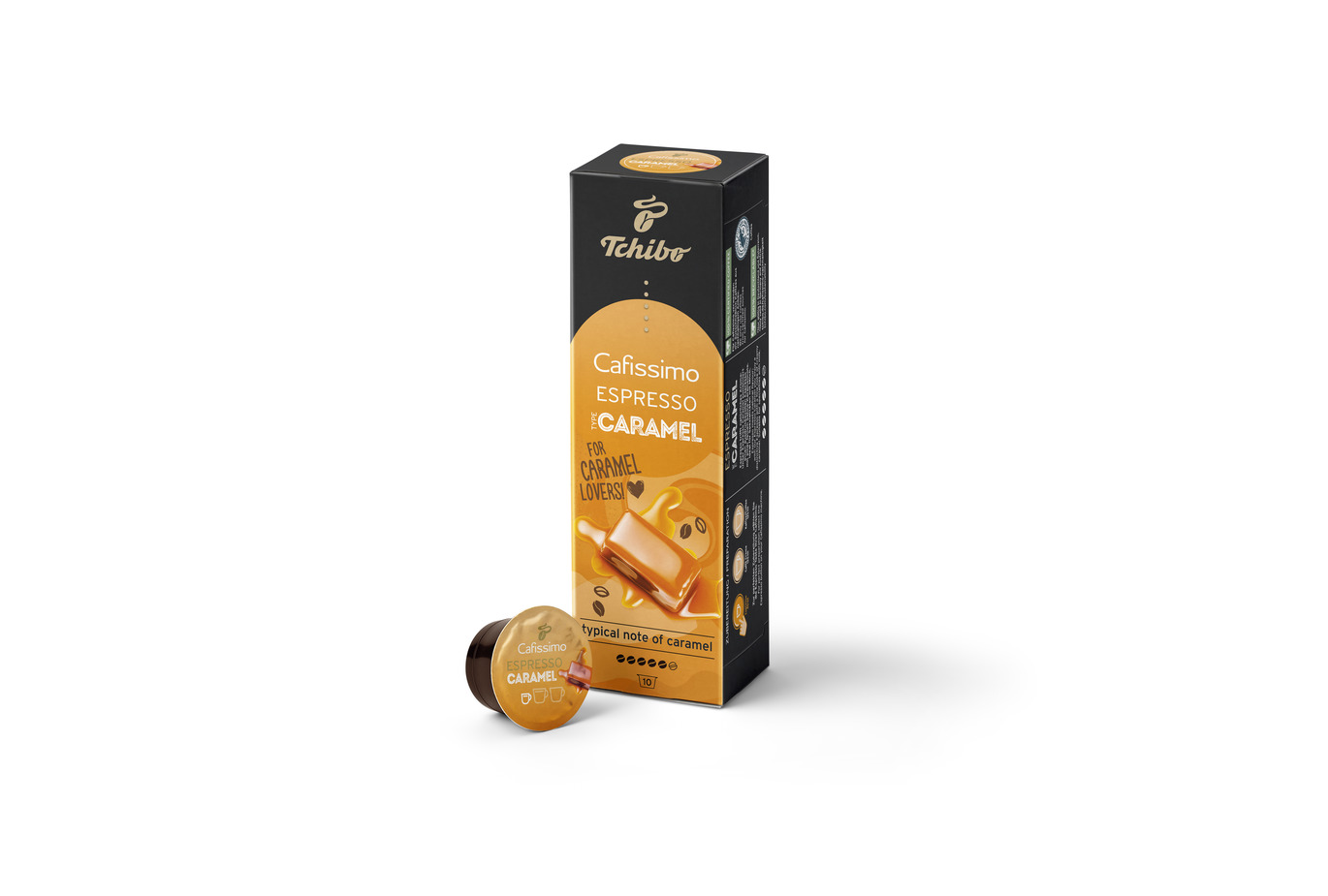 Pudełko kapsułek do kawy. Smak karmelowy. Kapsułka i cukierek karmelowy obok.
