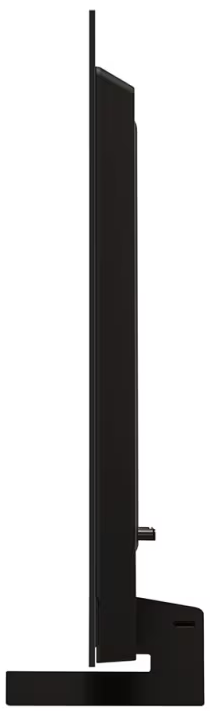 Cienki czarny telewizor, widziany z boku, zamontowany na czarnej podstawie na białym tle.