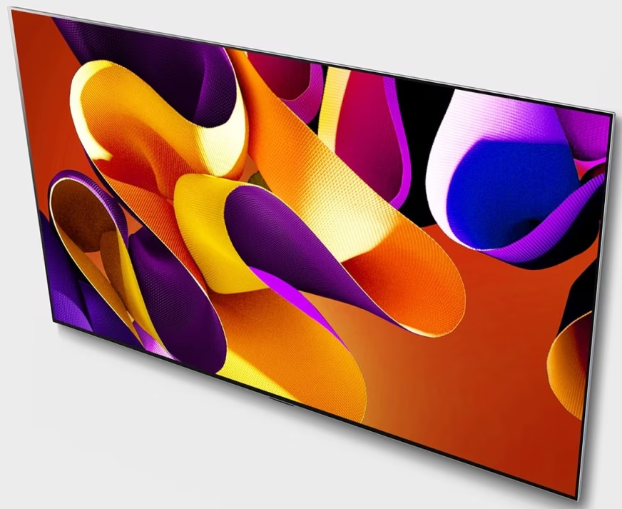 Ekran telewizora z dynamicznymi, zakrzywionymi kształtami w kolorach pomarańczowym, fioletowym i żółtym na czerwonym tle.