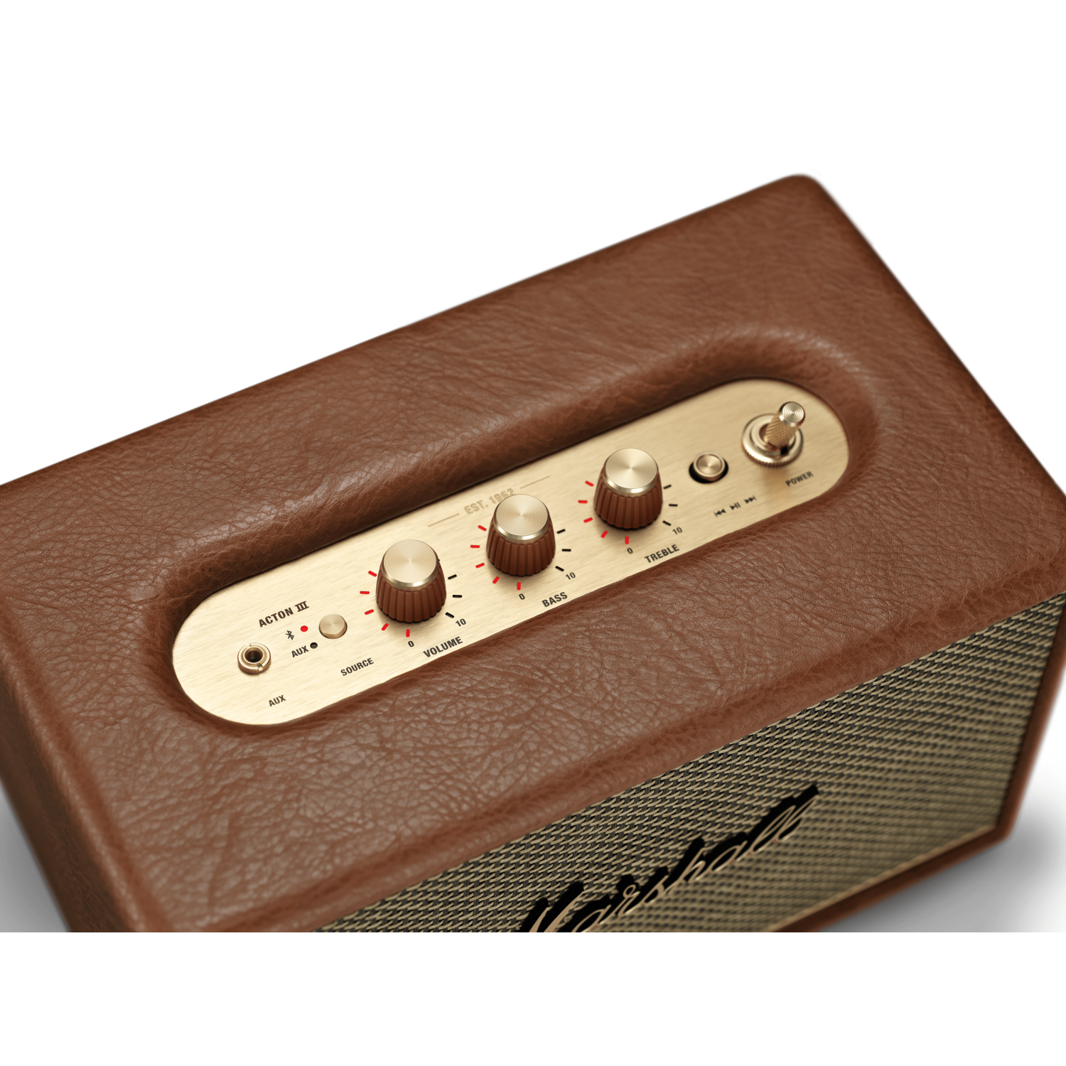 Brown leather speaker, with gold knobs and a gold trim.
