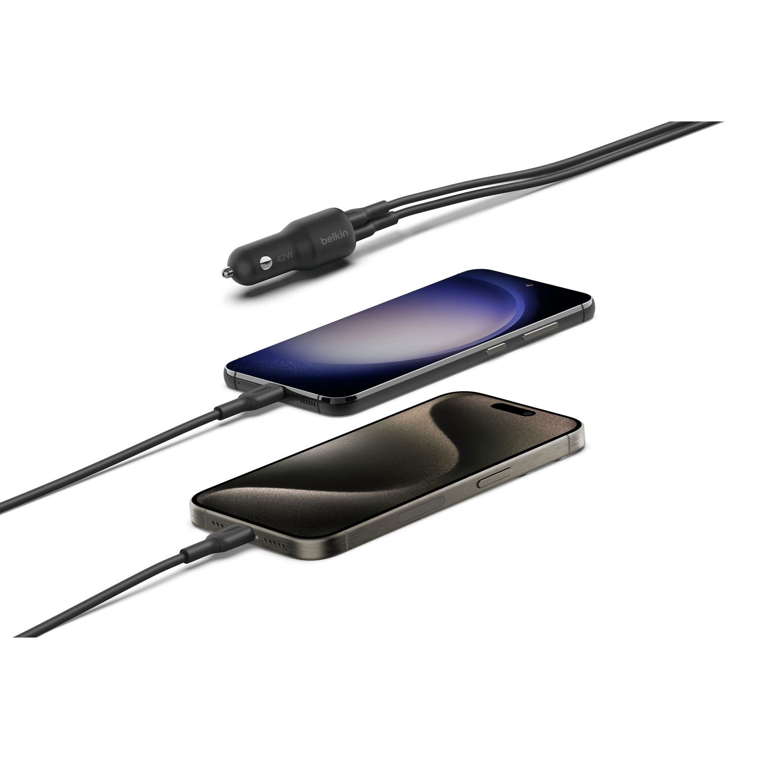 Two phones charging with a Belkin adapter in the middle.