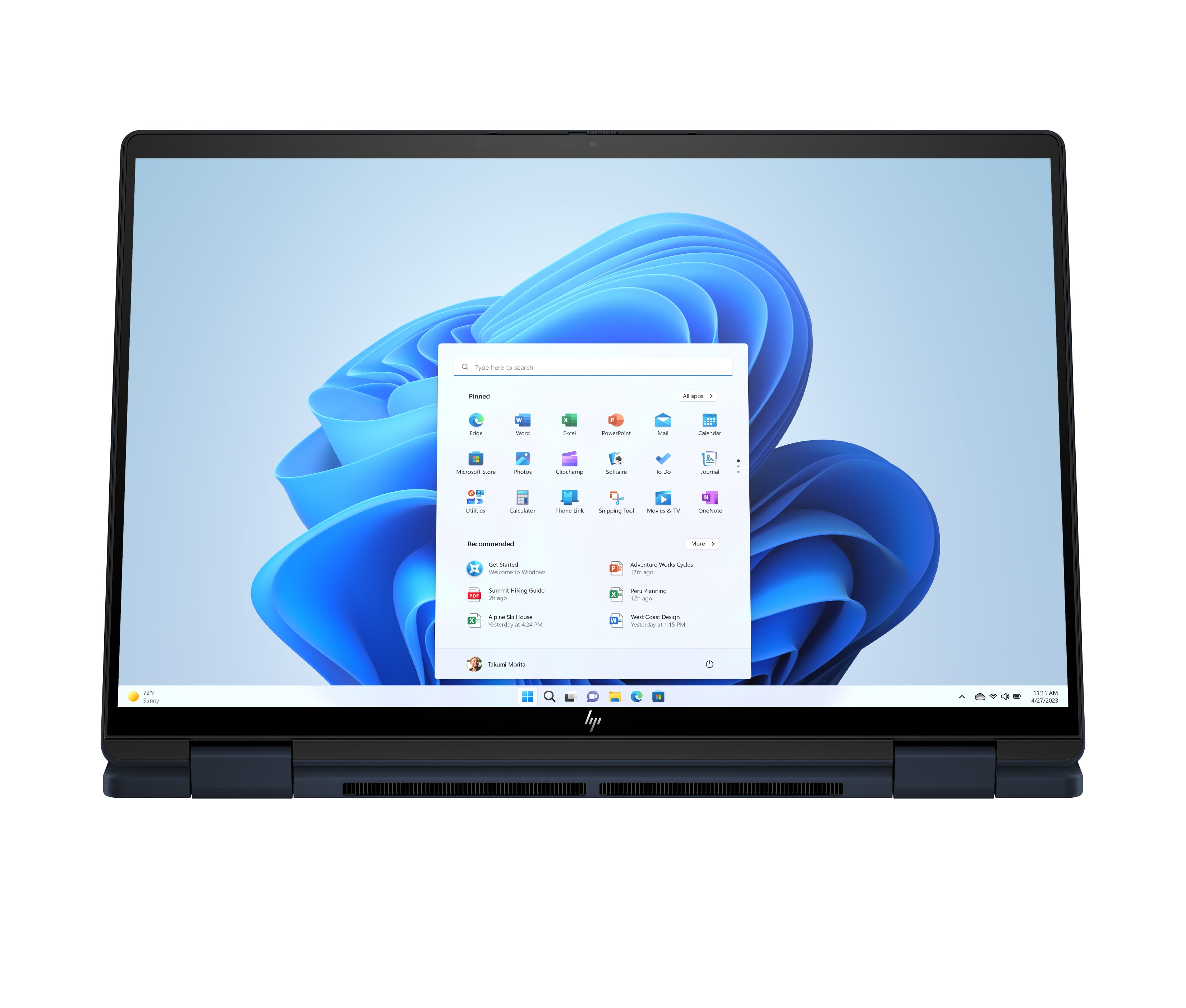 Un portátil con la interfaz de Windows 11 abierta, mostrando iconos de aplicaciones en la pantalla.