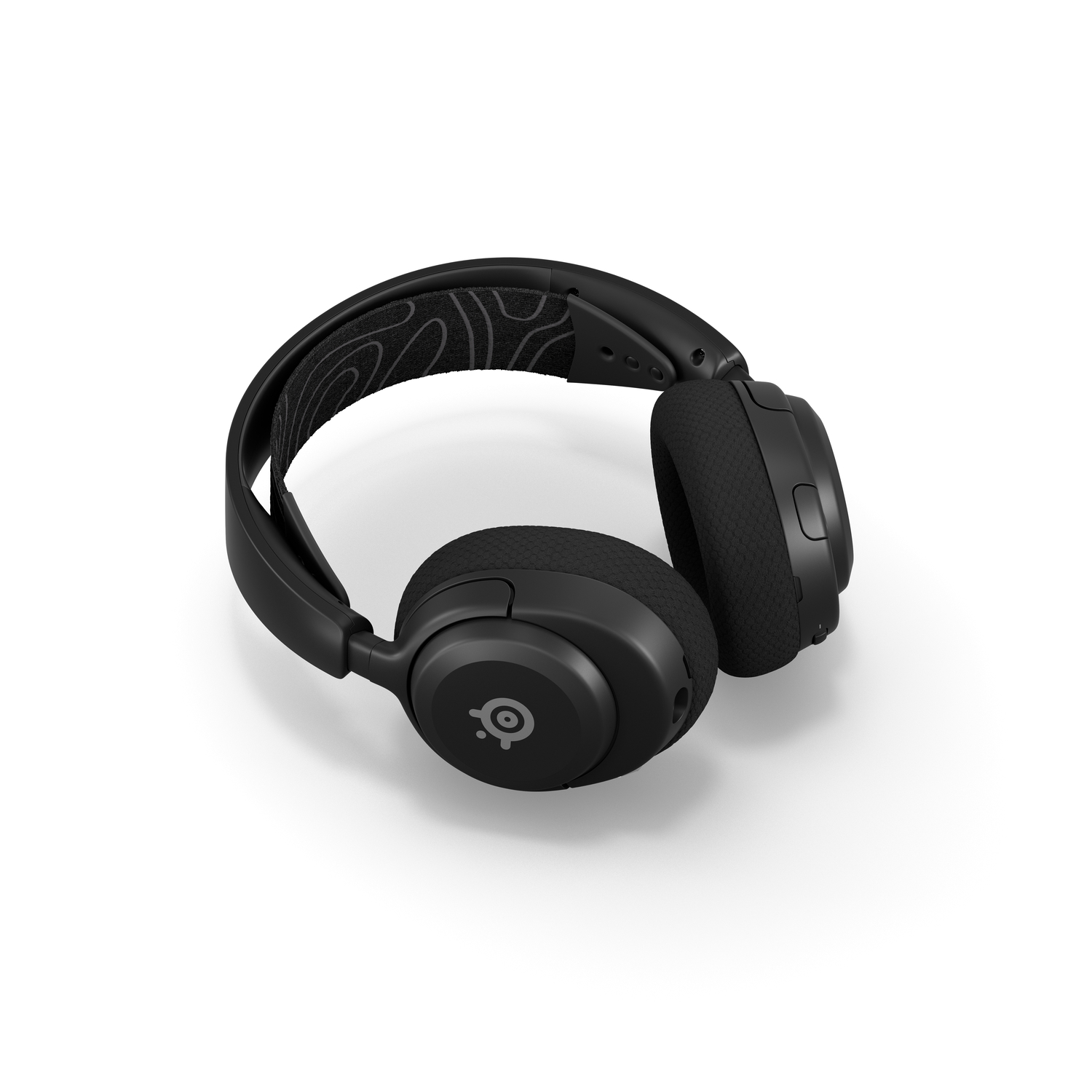 Casque audio noir sur fond blanc. Le casque est incliné vers la droite.