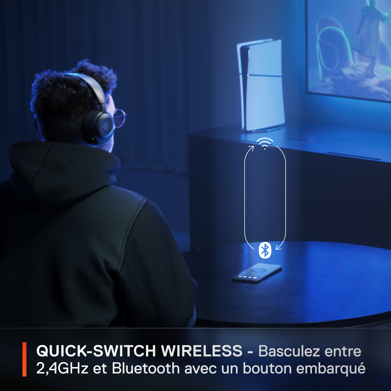 Une personne portant un casque utilise un téléphone pour se connecter à un appareil sans fil.