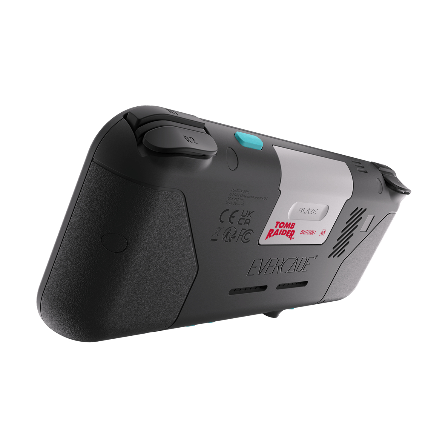 Evercade Handheld-Konsole. Die Konsole ist schwarz und grau mit dem Tomb Raider-Logo auf der Rückseite.