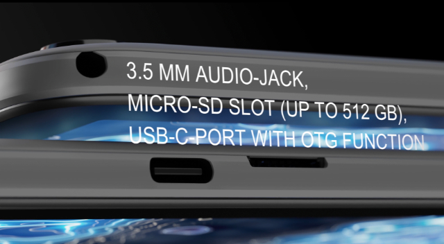 Egy eszköz közeli képe, audio jackkel, micro-SD foglalattal és USB-C porttal, OTG funkcióval.