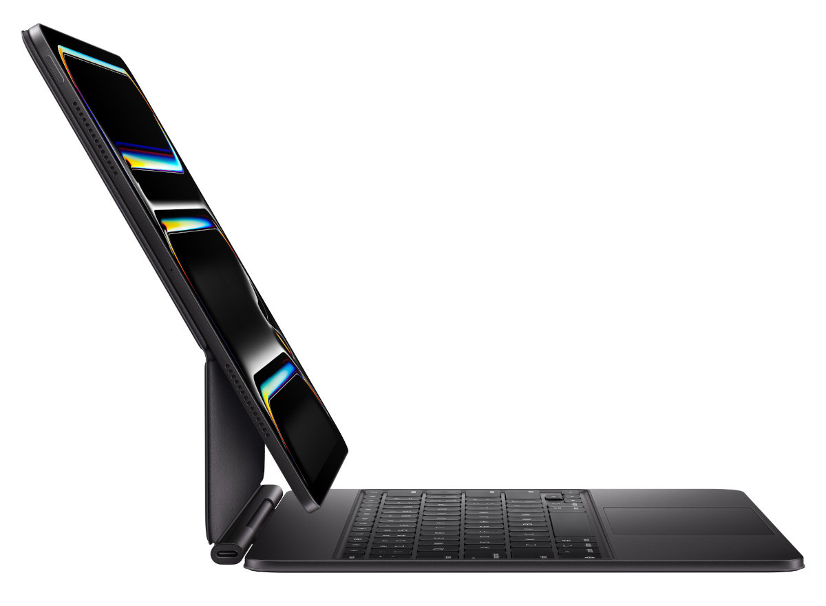 Czarny tablet na klawiaturze, pochylony do góry. Ekran wyświetla kolorowy obraz.