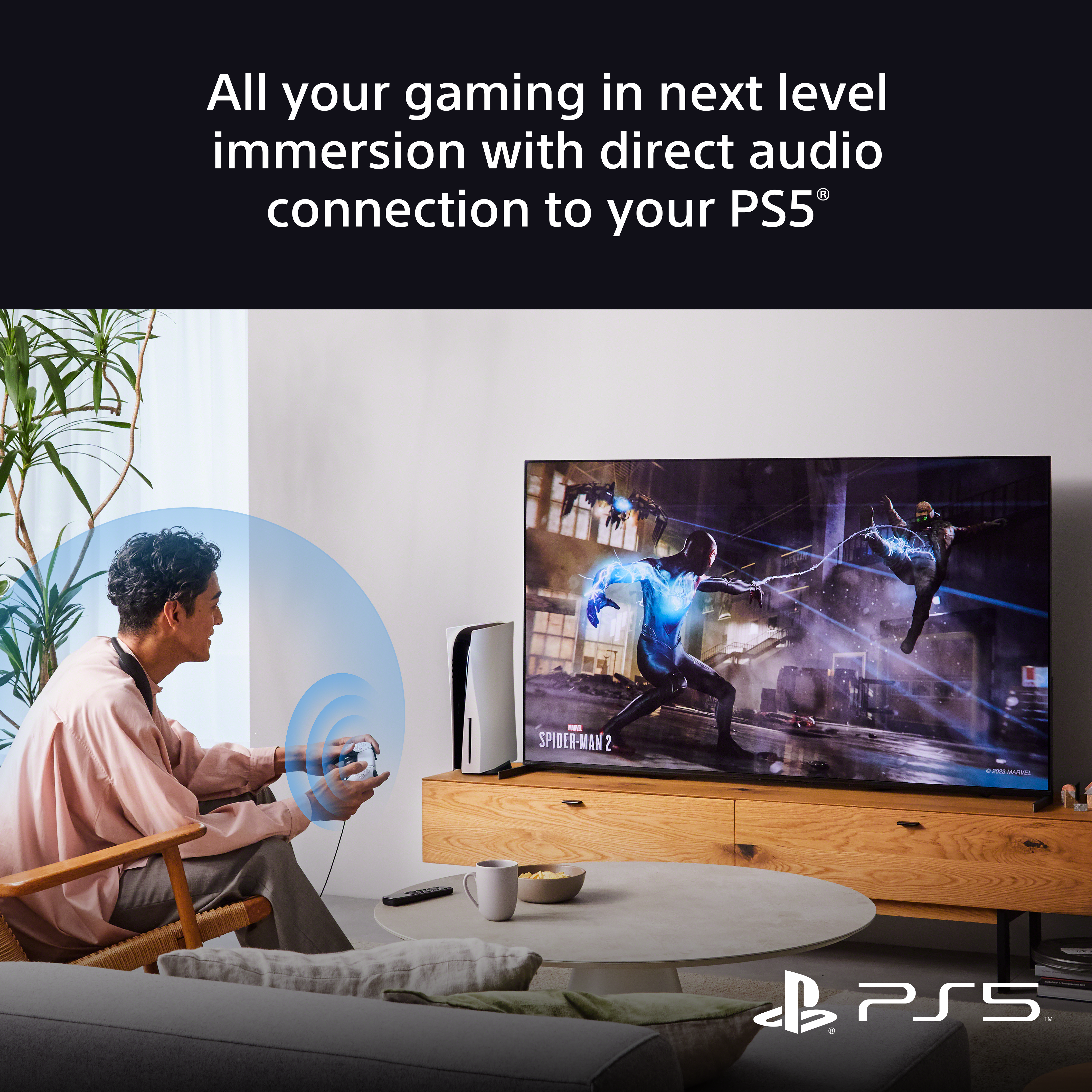 Homme jouant à un jeu sur une TV avec une PS5. Le texte dit : 'All your gaming', etc.