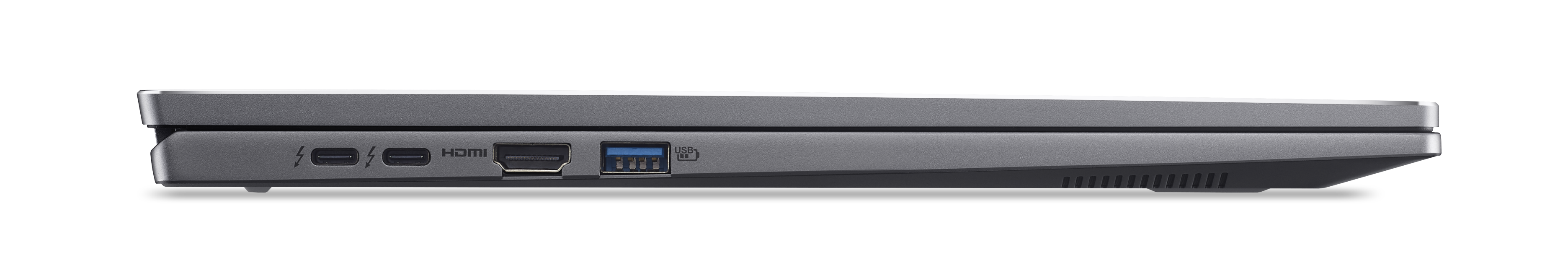 Vista lateral de un portátil plateado. Varios puertos son visibles, incluyendo USB y HDMI.