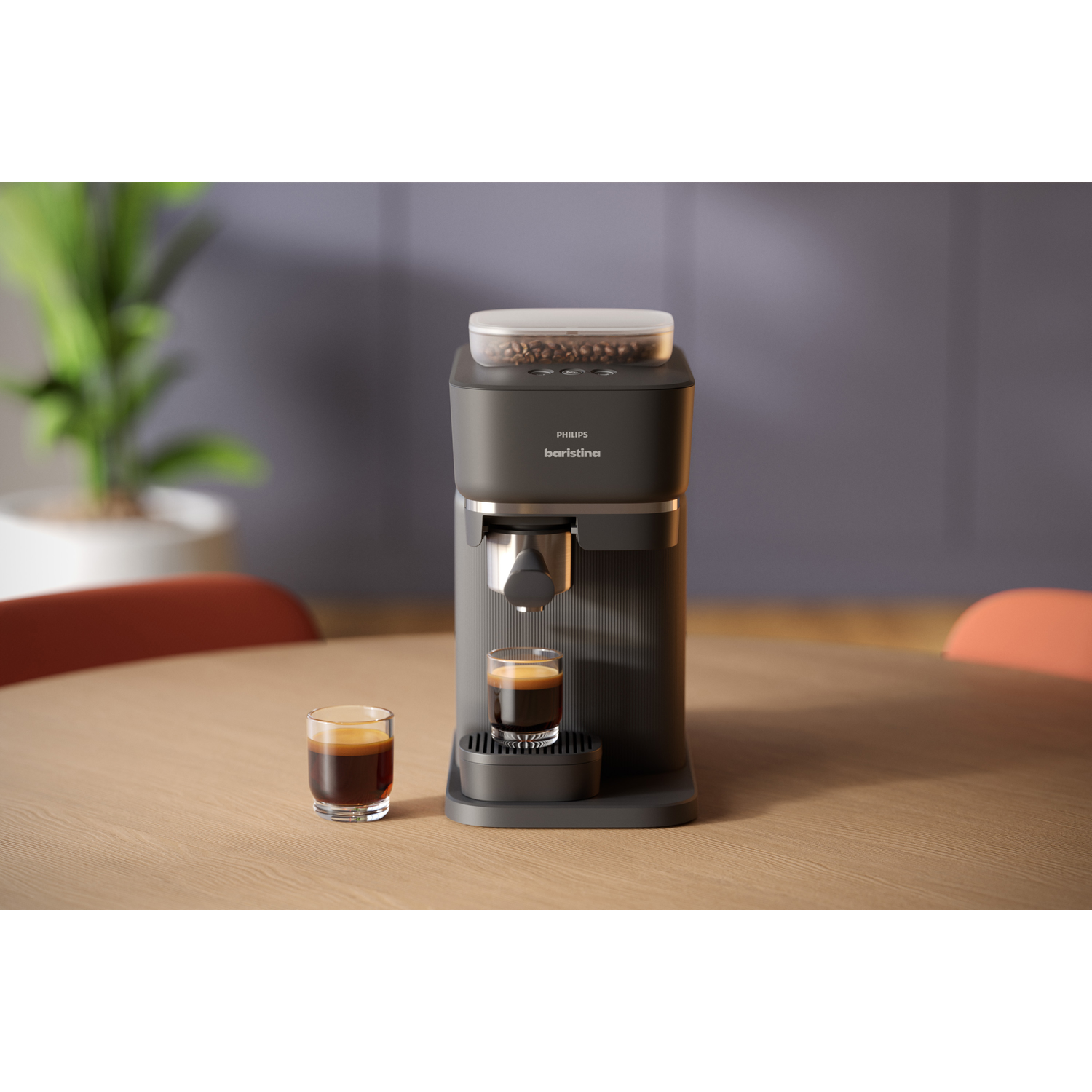 Donkergrijze Philips barista koffiemachine met twee espressoglazen op een tafel.