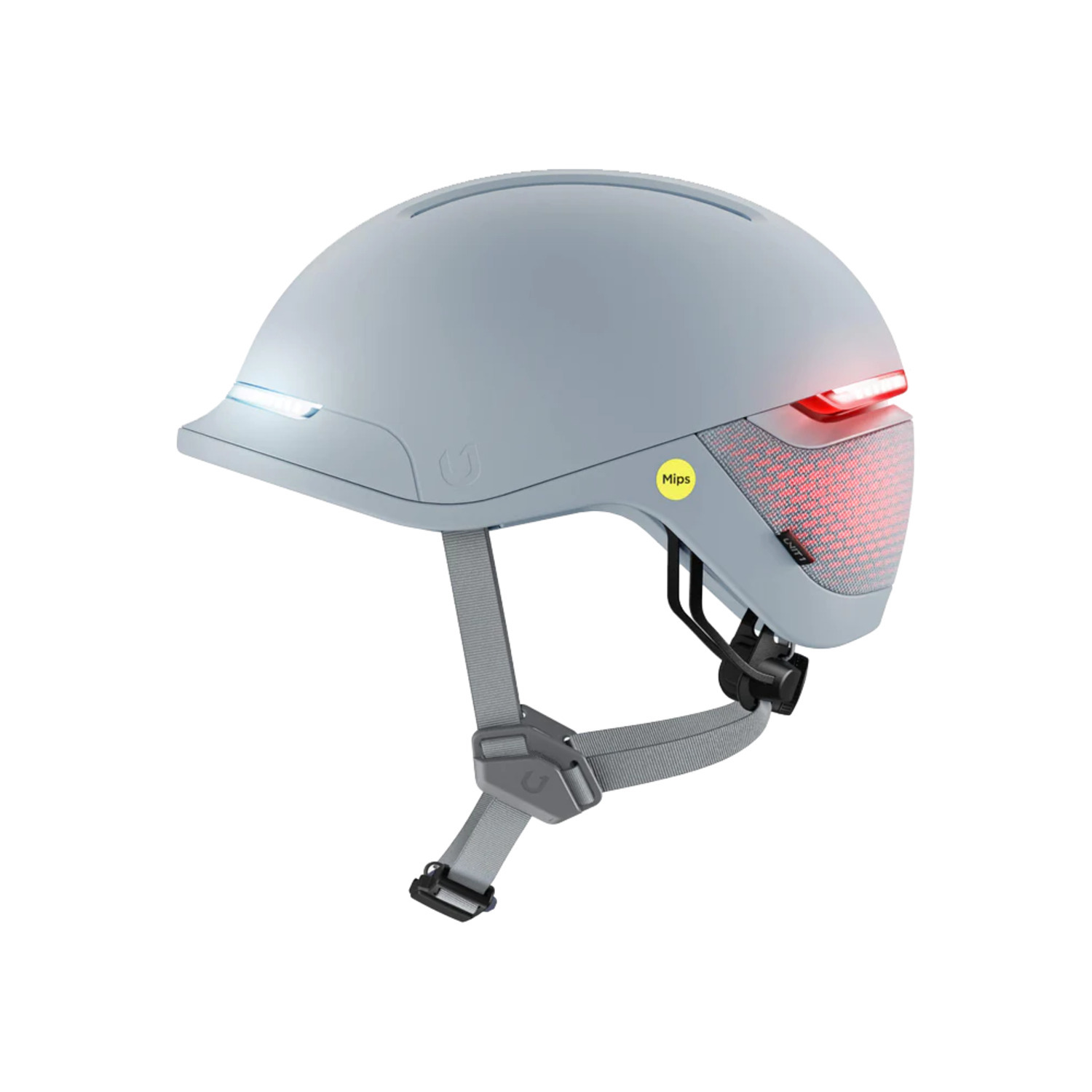 Een lichtgrijze fietshelm met geïntegreerde verlichting en een MIPS-sticker.