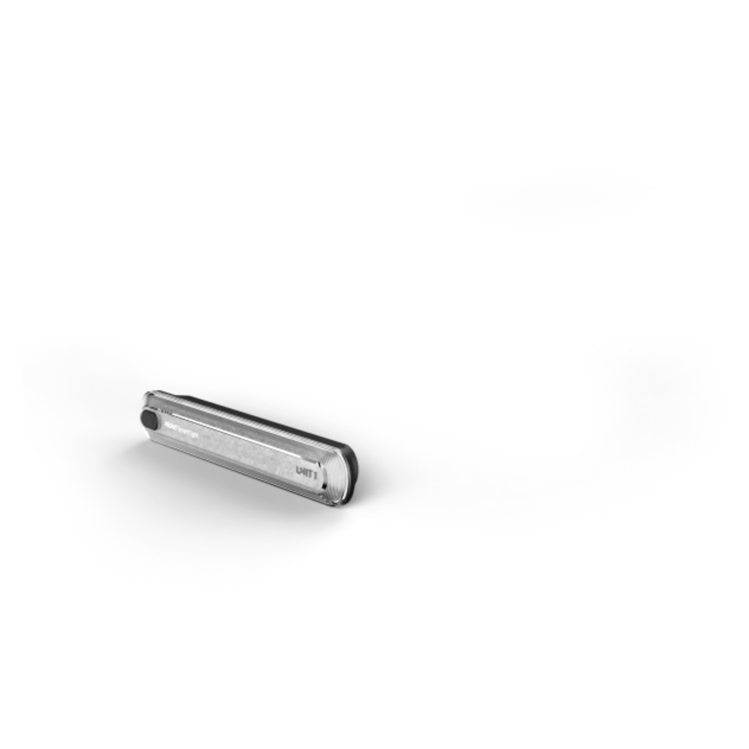 Un appareil de couleur argent avec un bouton gris sur fond blanc.