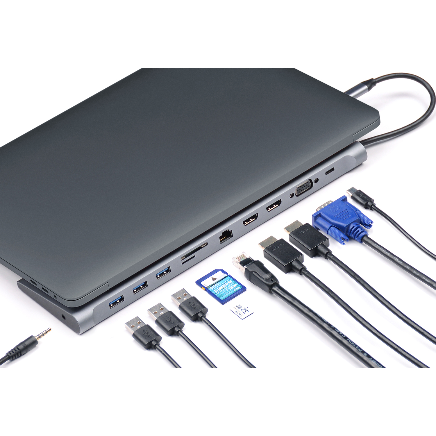 Laptop con vari cavi collegati. Include slot USB, HDMI e schede SD.