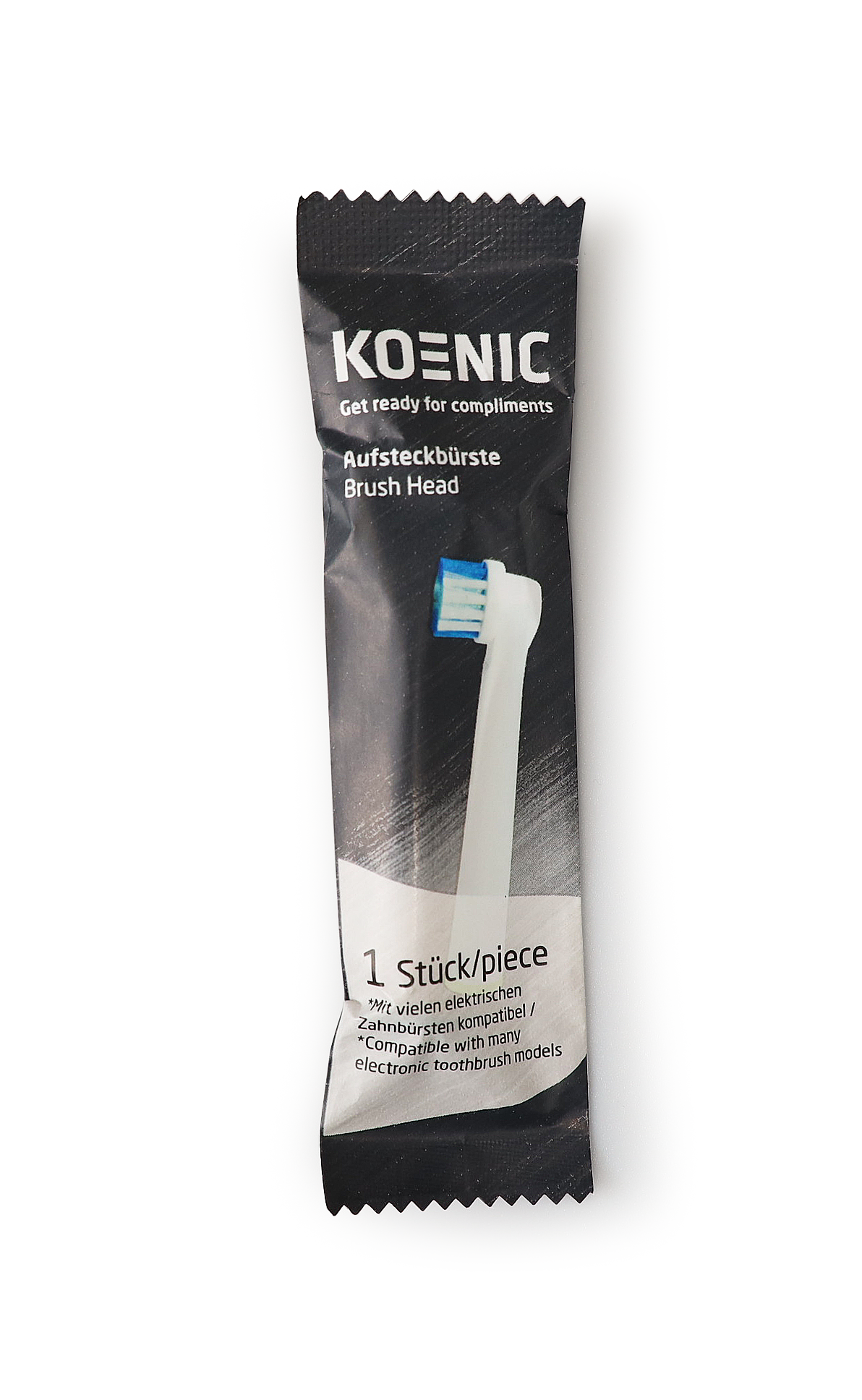 Główka szczoteczki do zębów w czarno-białym opakowaniu, z tekstem z przodu.