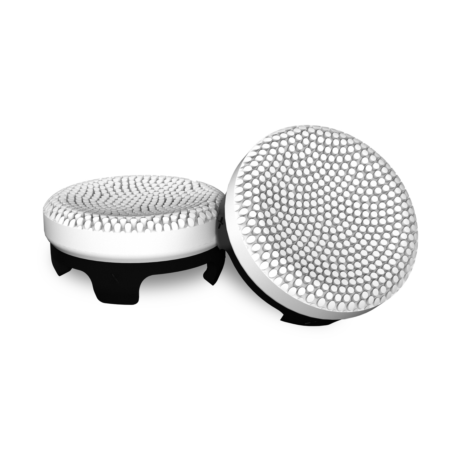 Two white and black electric shaver heads. White surface.
