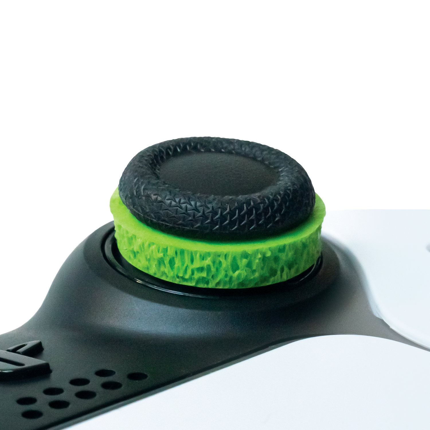 Close-up of a black and green joystick thumb grip.