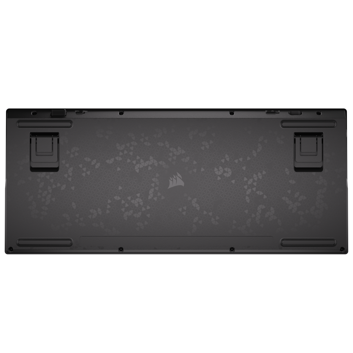 Black Corsair keyboard's underside, showing textured surface and mounting features, on black.