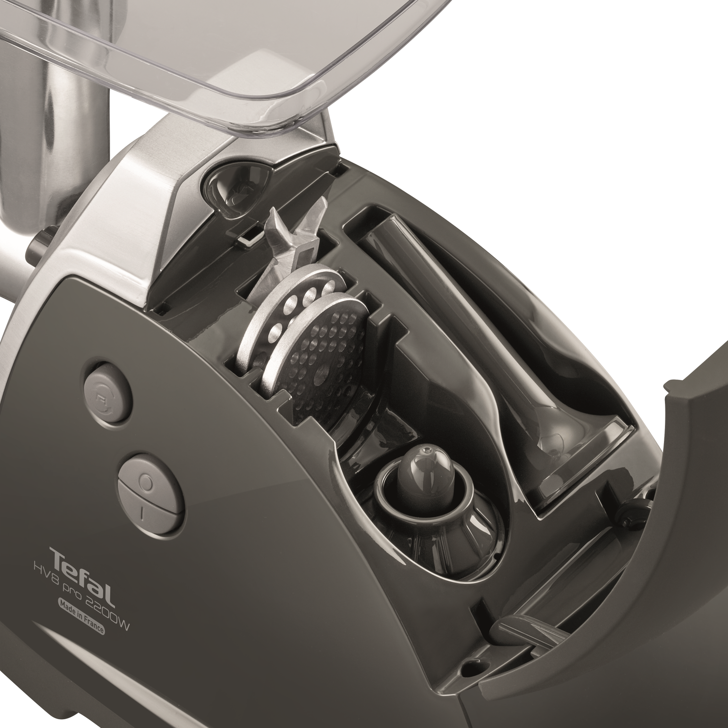 Gray meat grinder, open, internal parts visible.