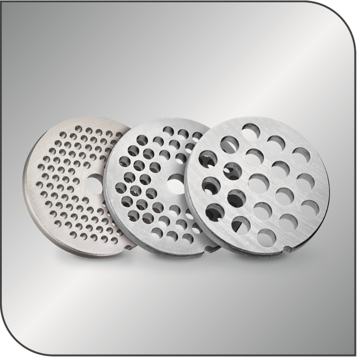 Three metal grinder plates with different hole patterns on a gray gradient background.