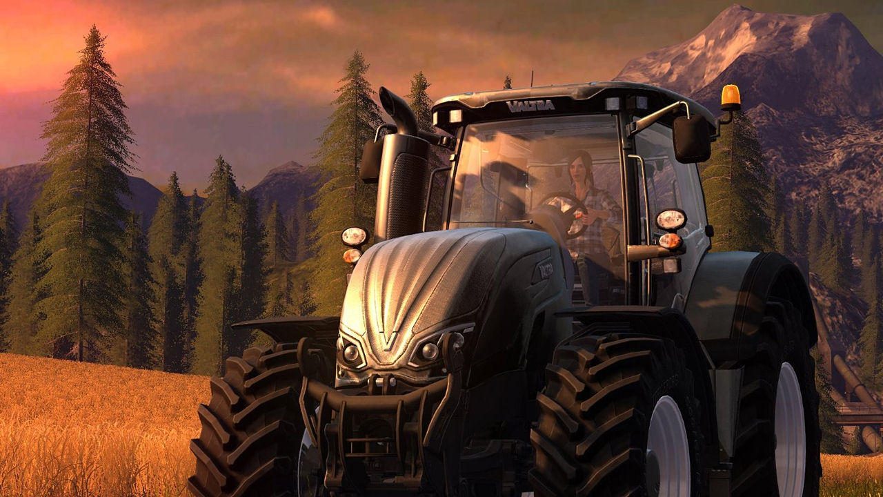 Un tracteur dans un champ au coucher du soleil. Une femme conduit le tracteur.