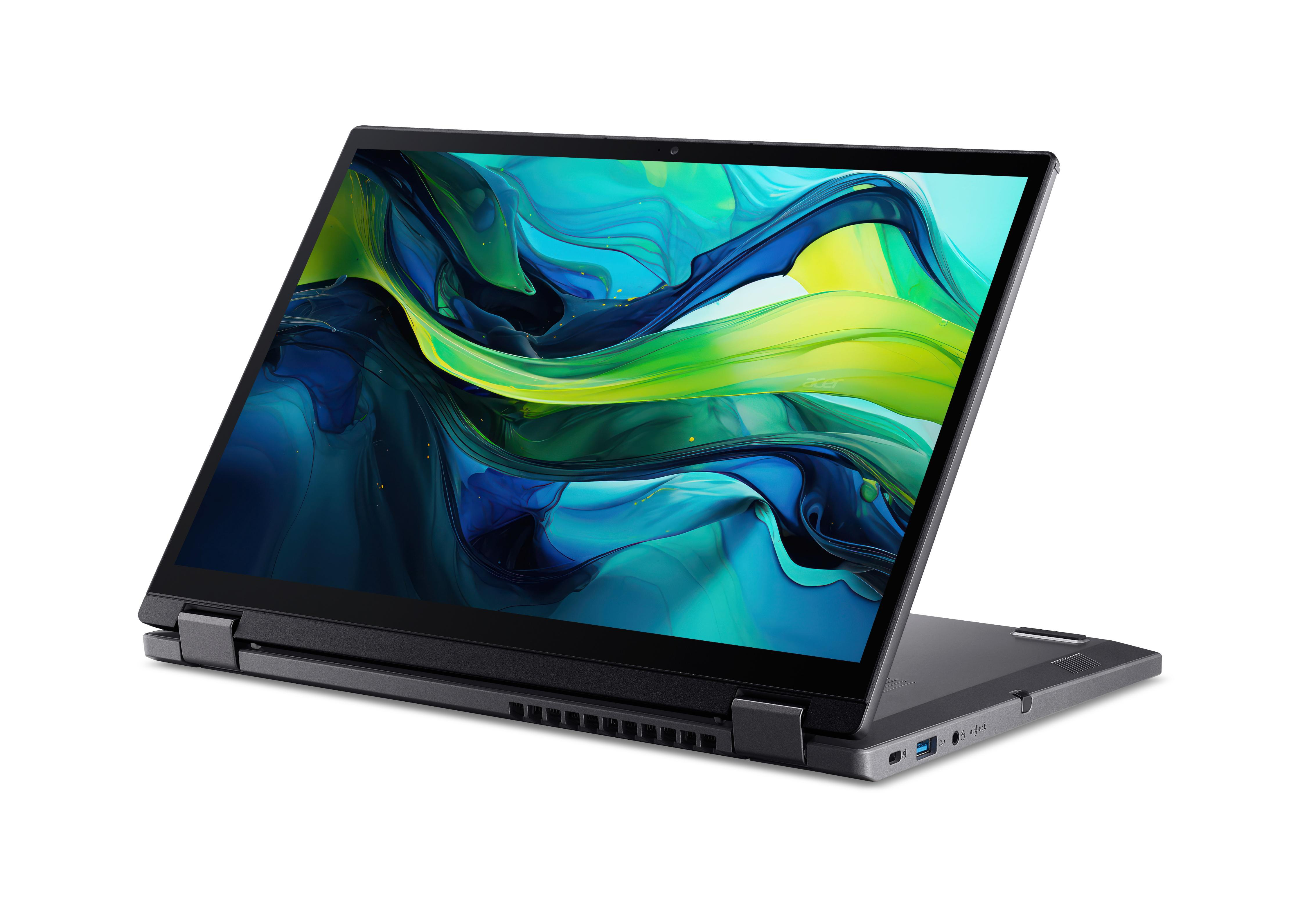 Laptop mit offenem Bildschirm, der ein farbenfrohes Hintergrundbild zeigt. Der Laptop steht auf einer weißen Oberfläche.