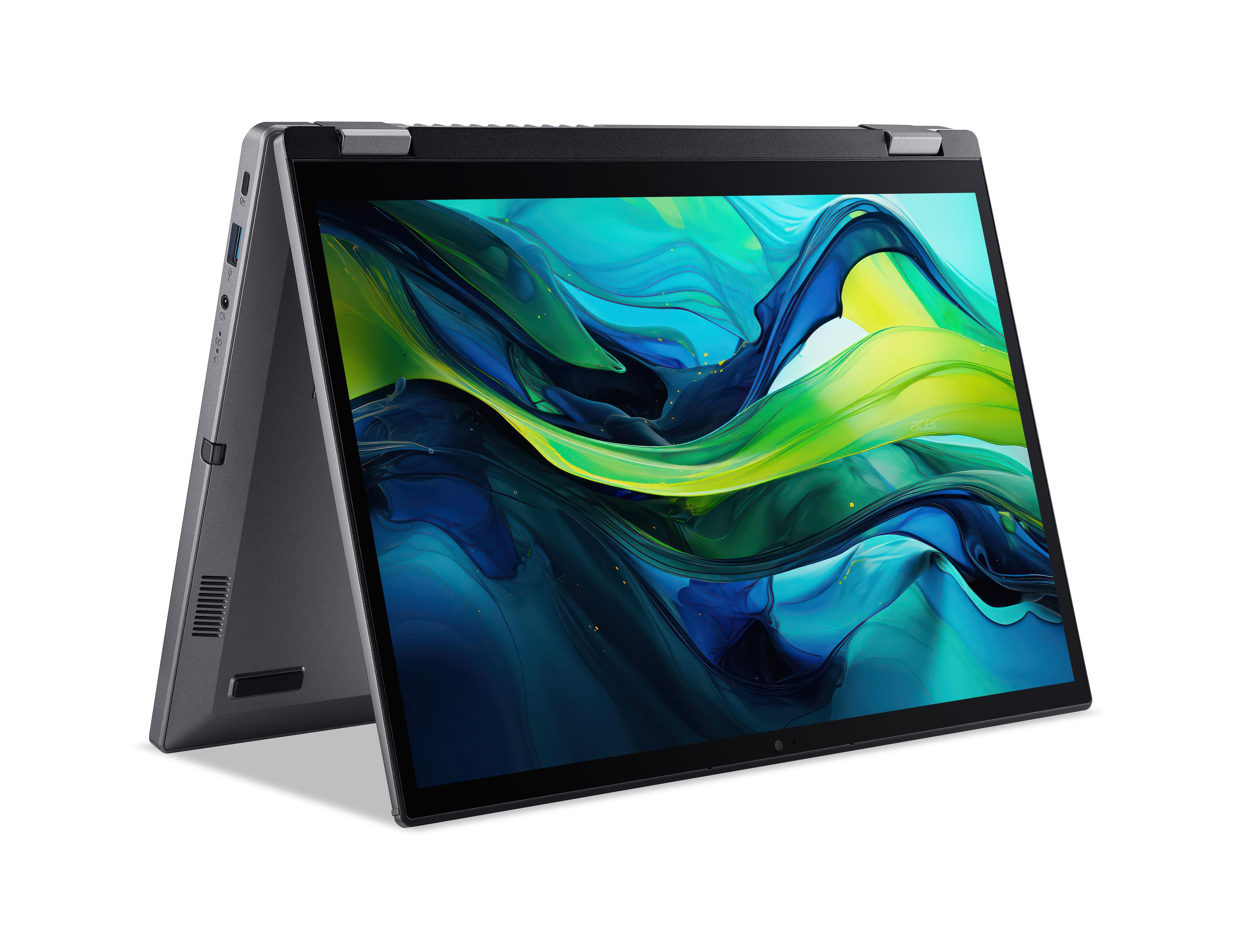 Ein schwarzer Laptop ist geöffnet, der Bildschirm zeigt ein blaues, grünes und gelbes abstraktes Bild vor weißem Hintergrund.