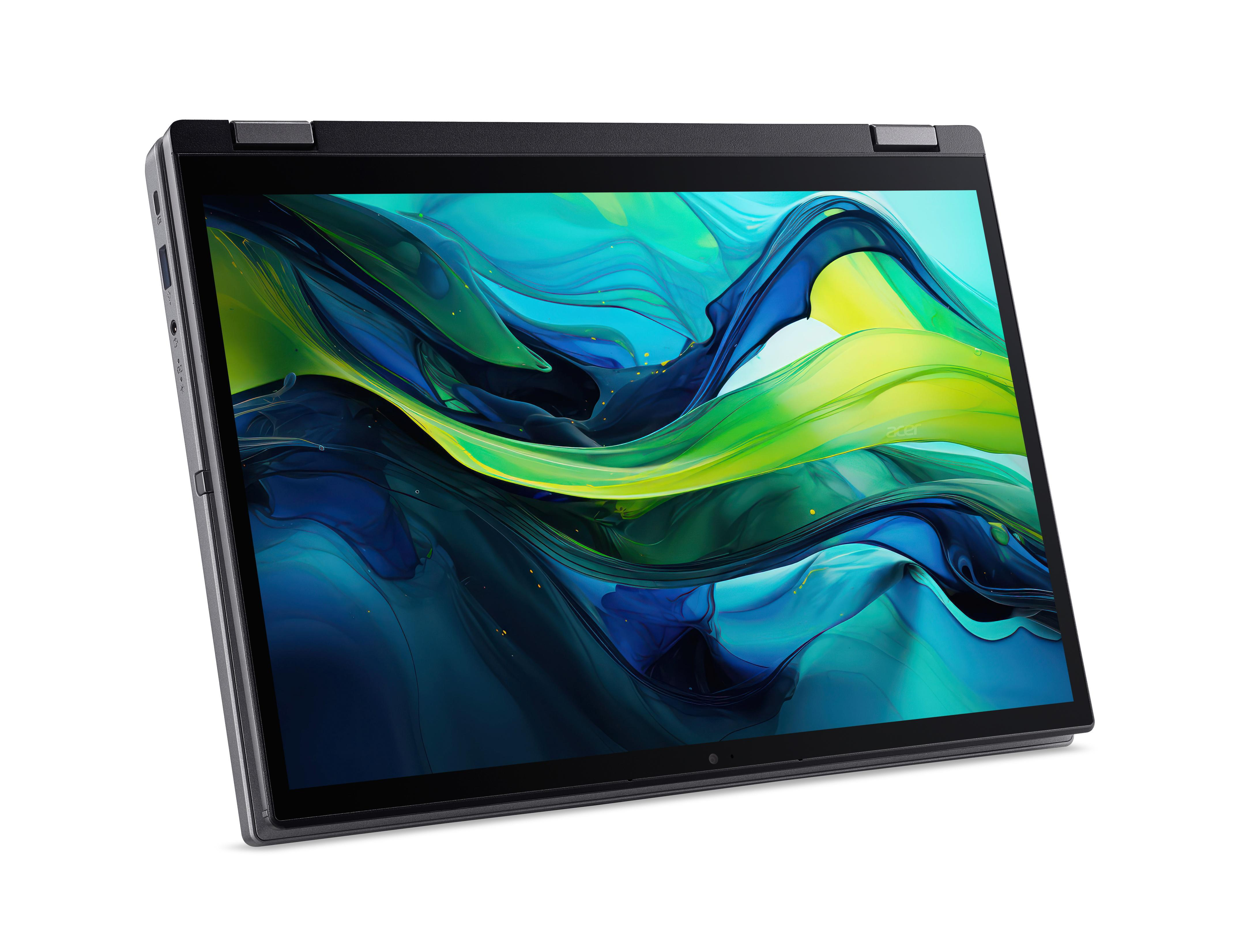 Ein Laptop mit einem Bildschirm. Der Bildschirm ist angewinkelt. Weißer Hintergrund. Der Laptop ist grau und schwarz.