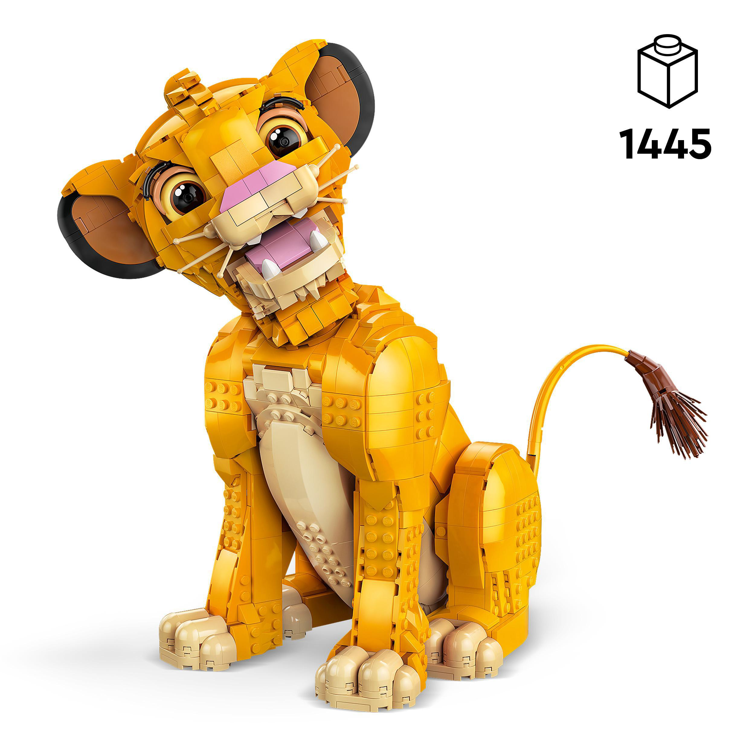 Eine LEGO Simba-Figur, gelb mit braunem Schwanz, sitzt und schaut lächelnd nach oben.