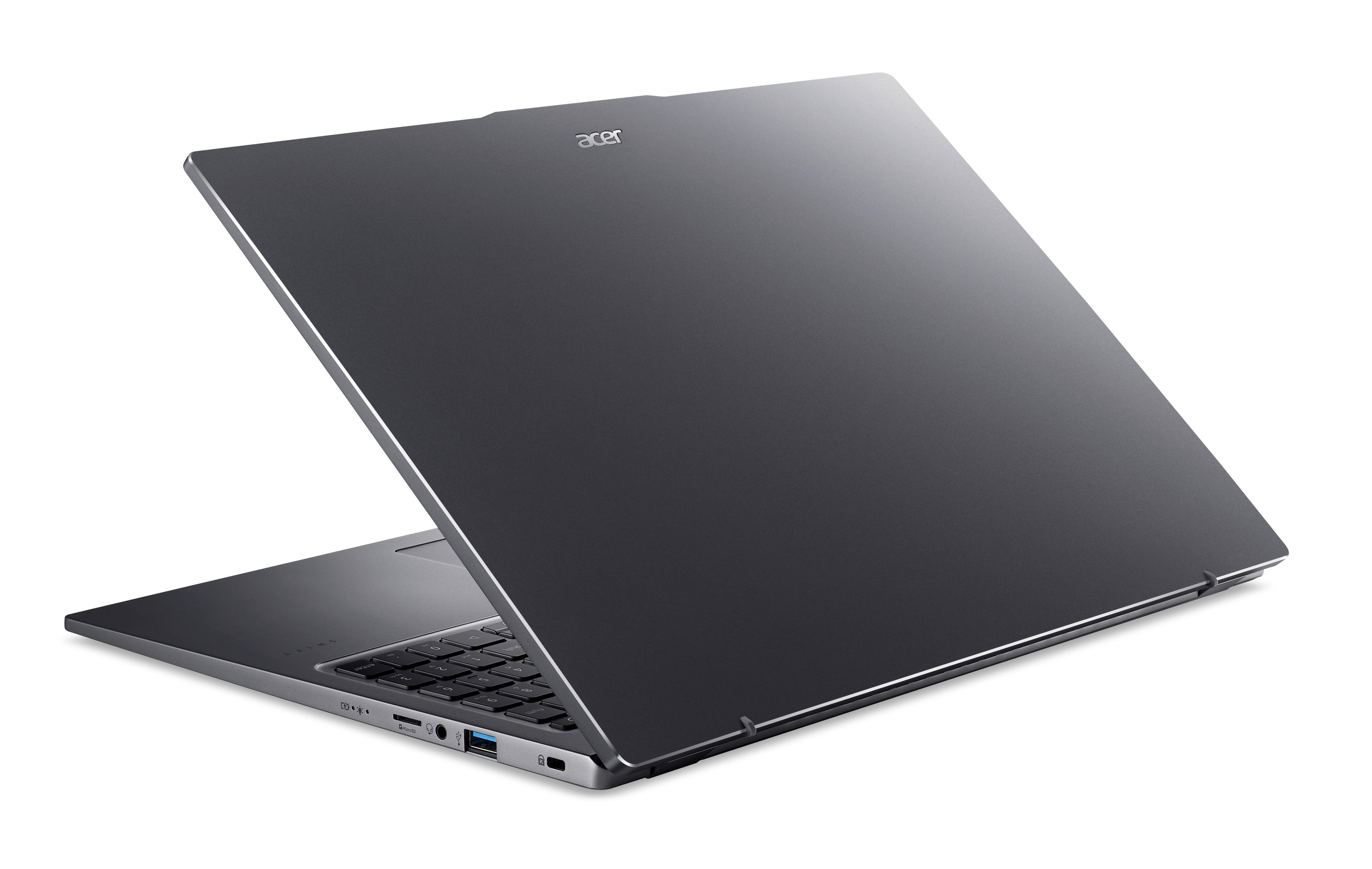 Silberner Laptop leicht geöffnet. Das Wort "acer" ist auf dem Bildschirm sichtbar.