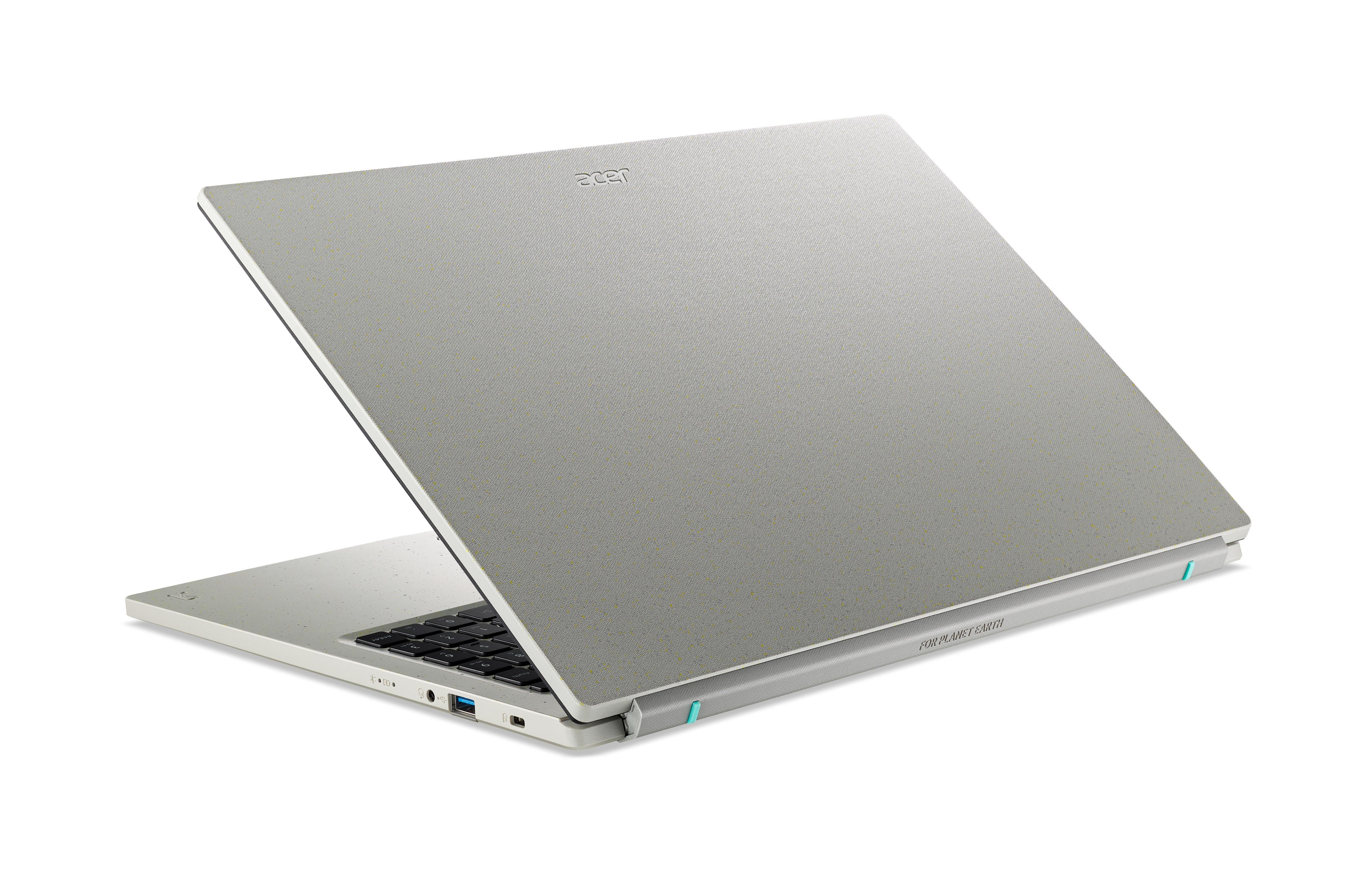 Ein Laptop von hinten, teilweise geöffnet. Das Acer-Logo ist sichtbar und ein grüner Akzent.