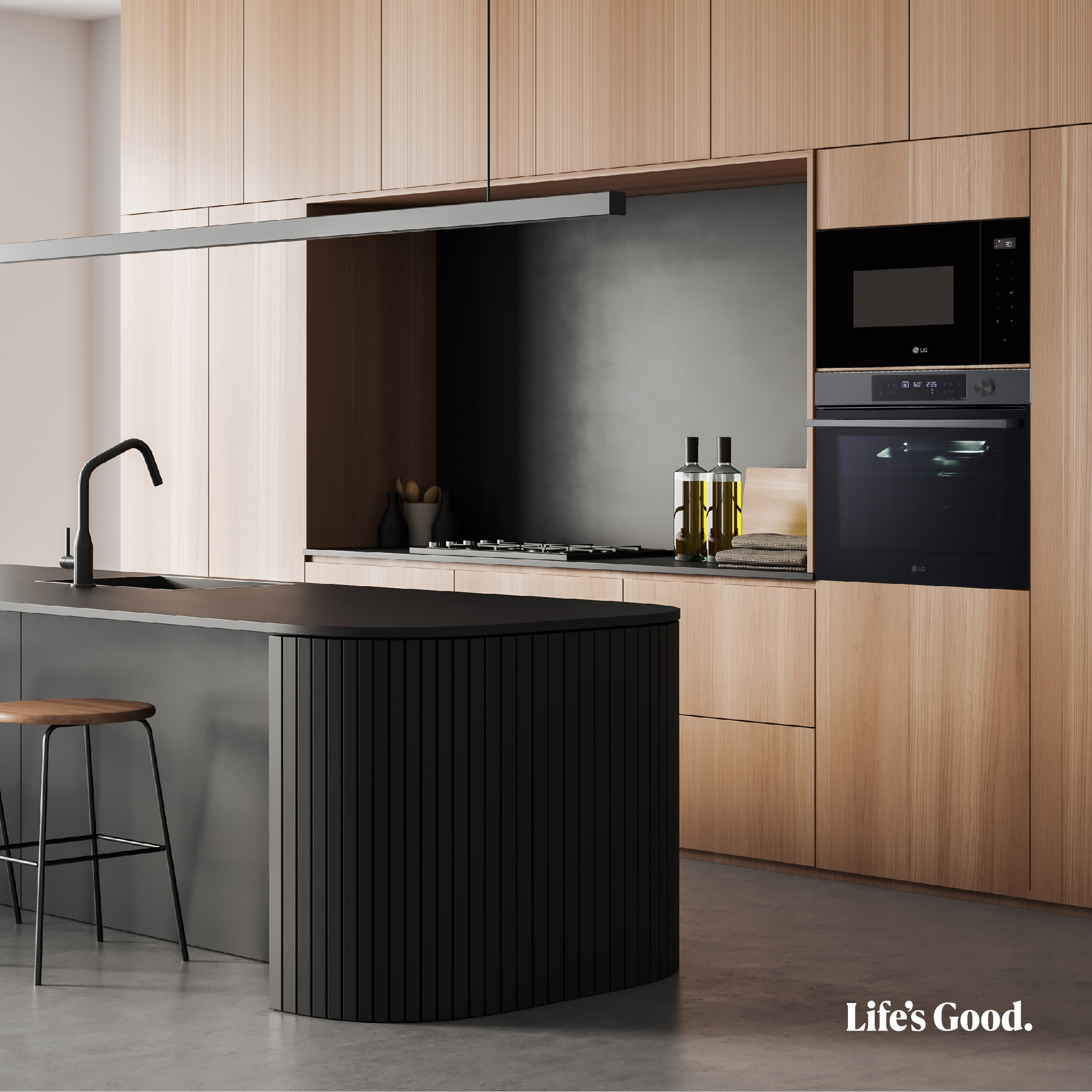 Cocina moderna con gabinetes de madera, isla negra y electrodomésticos.