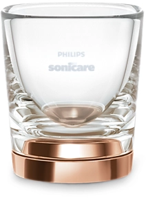 Átlátszó üveg rózsaarany alappal. Philips Sonicare logó az üvegen. Fehér háttér.
