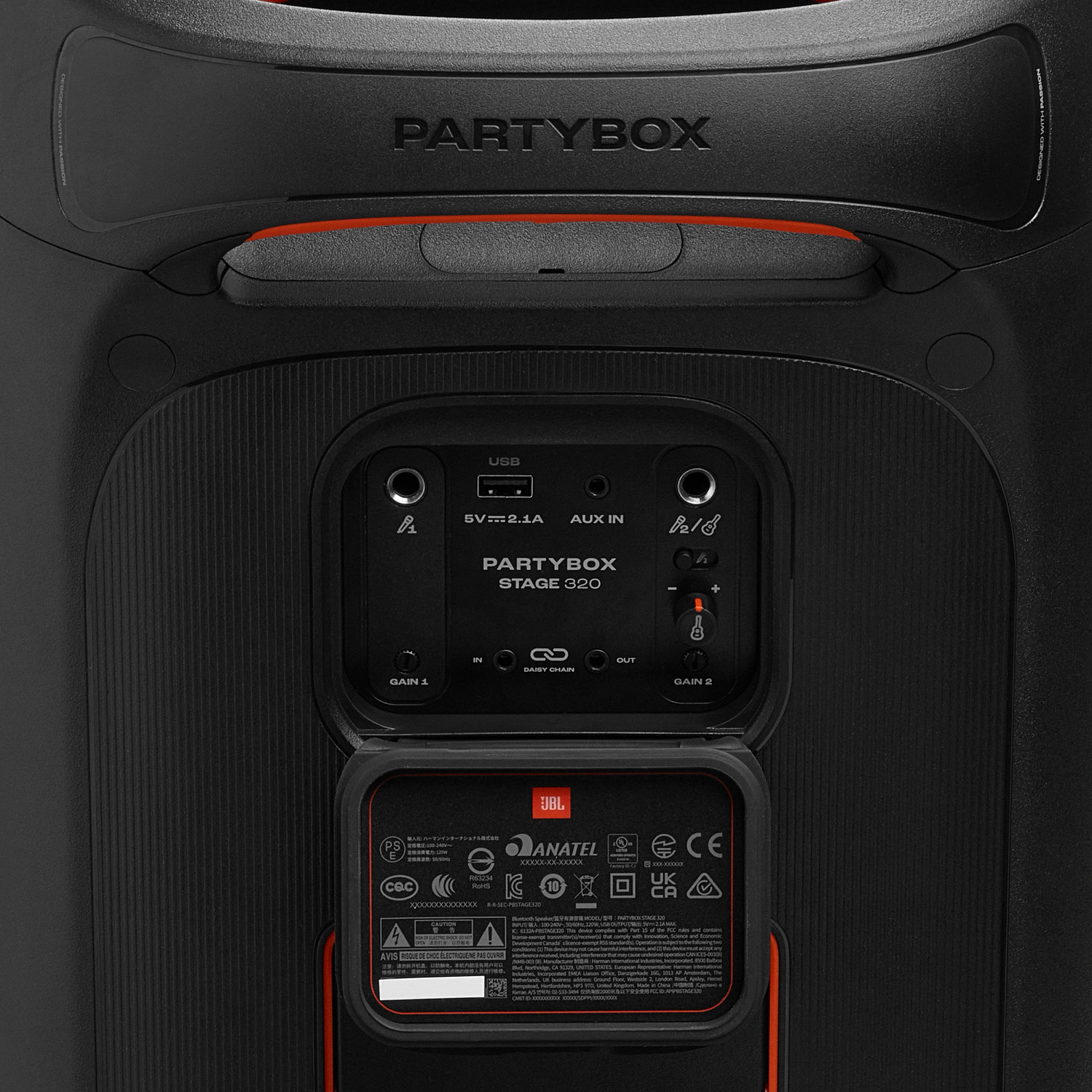 Enceinte PartyBox noire, avec panneau d'entrée visible, ports et commandes. Fond noir.