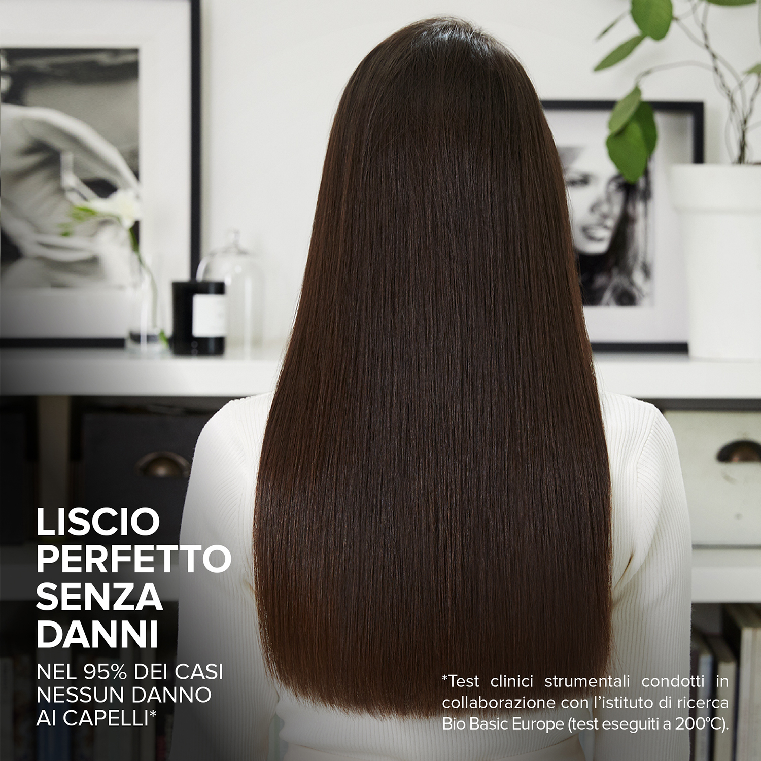 Schiena di una donna, con capelli lunghi, lisci e scuri. Il testo evidenzia la levigatezza dei capelli.