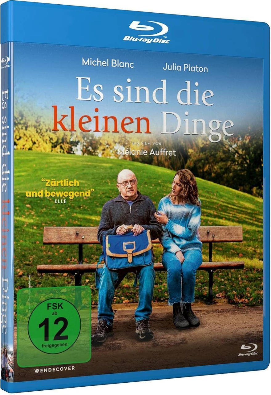 Filmcover von 'Es sind die kleinen Dinge' mit Mann und Frau auf einer Parkbank.
