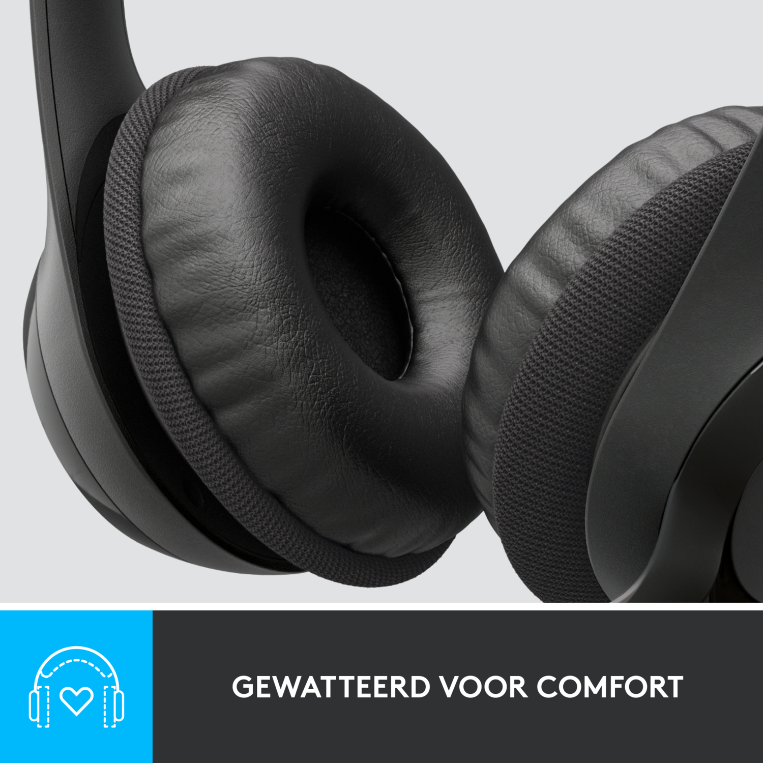 Close-up of black headphones. Earcups are soft and rounded.