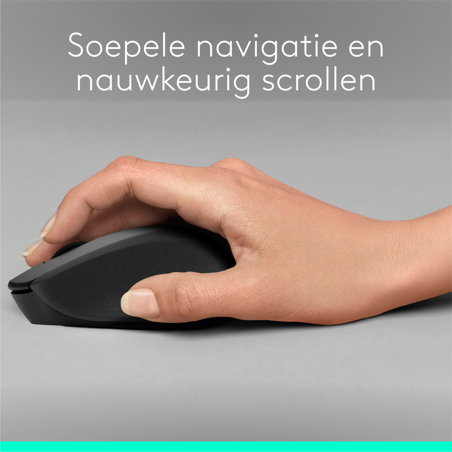 A hand holding a black computer mouse.
