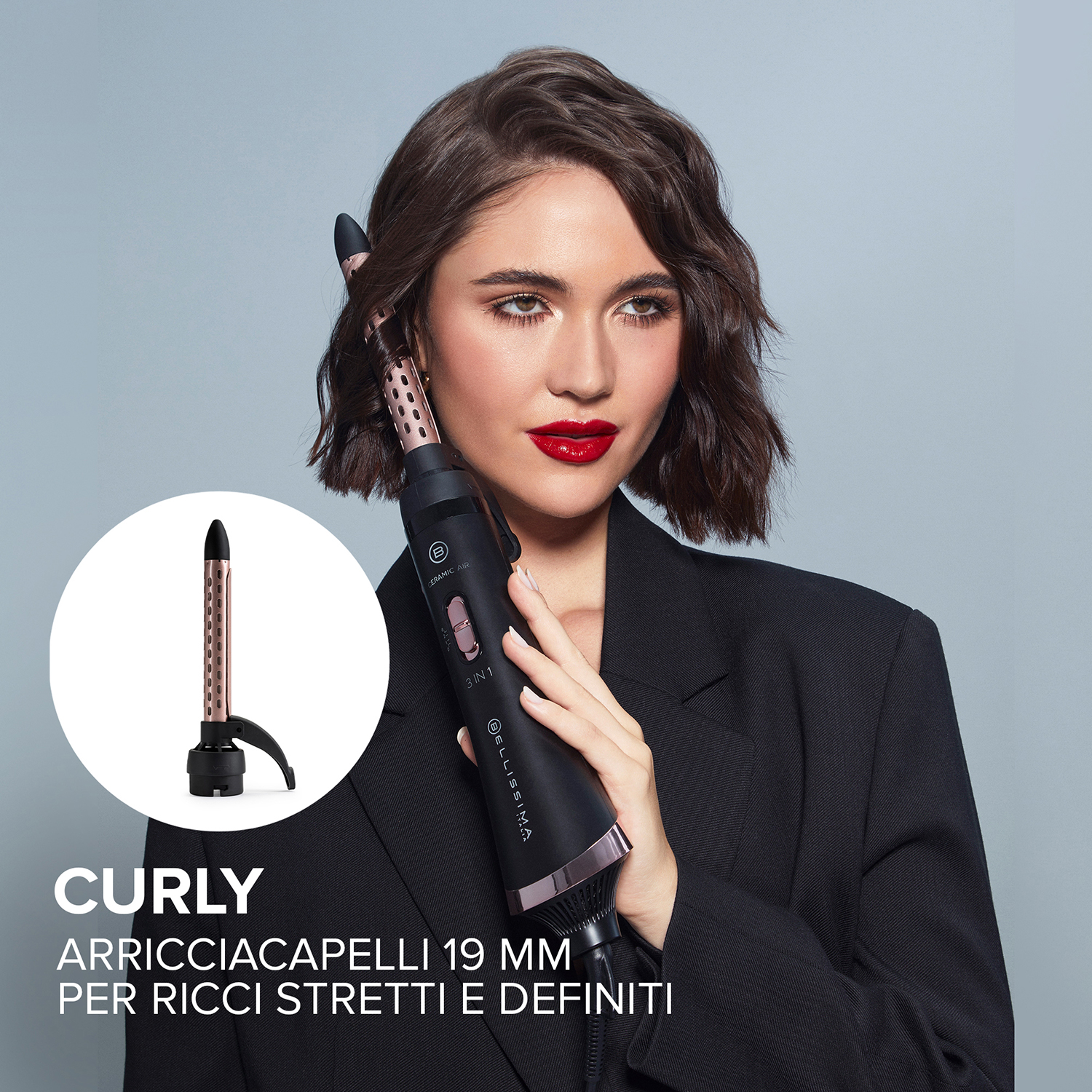Donna che usa un arricciacapelli. Testo: curling, arricciacapelli 19 mm per ricci stretti e definiti.