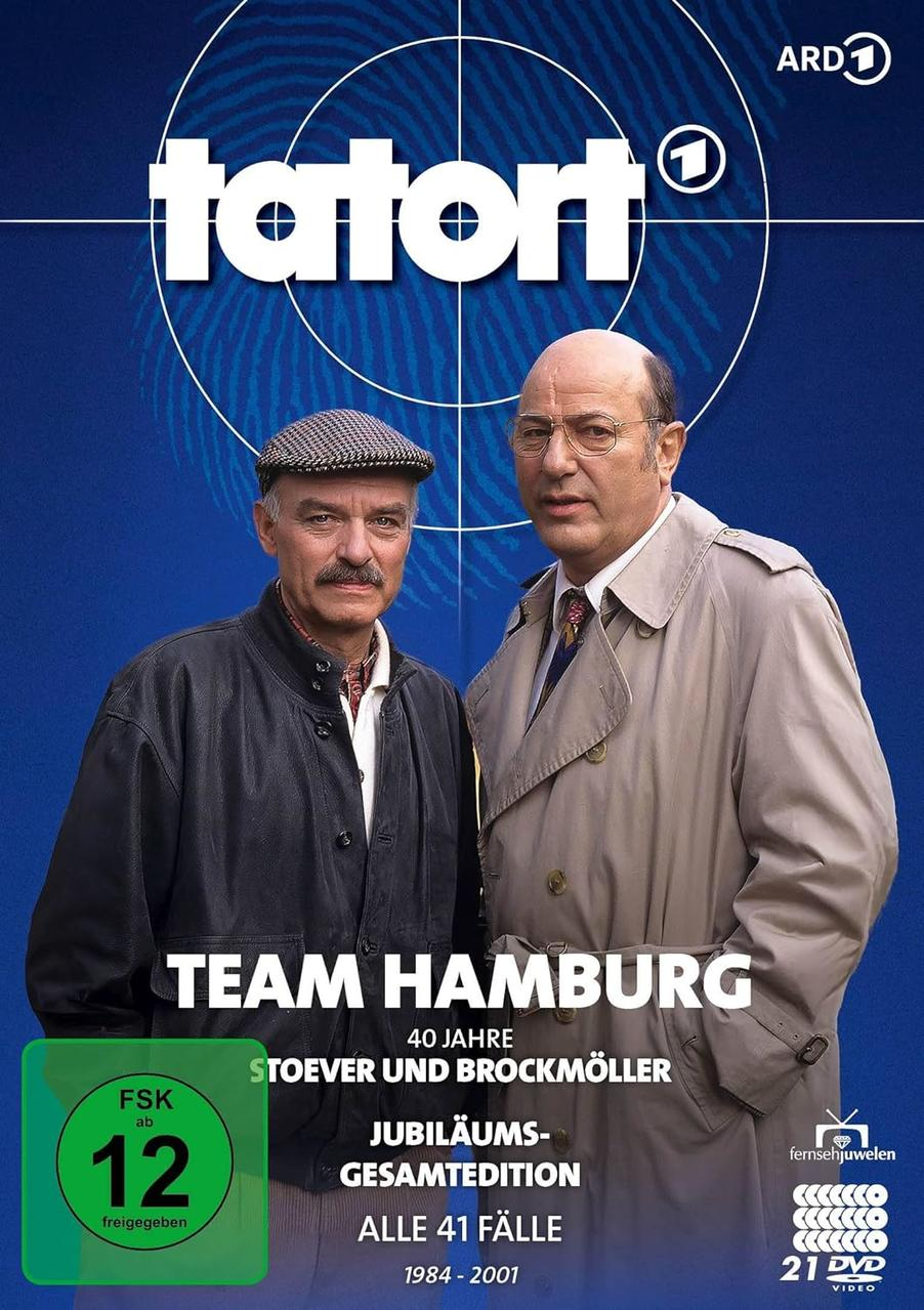 DVD-Cover von 'Tatort: Team Hamburg'. Zwei Männer vor blauem Hintergrund mit Text.