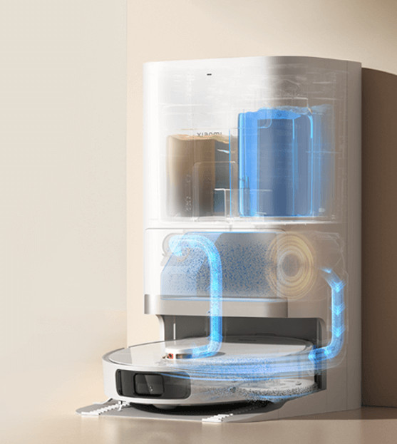 Przekrój robota odkurzającego, pokazujący komory na wodę i kurz.