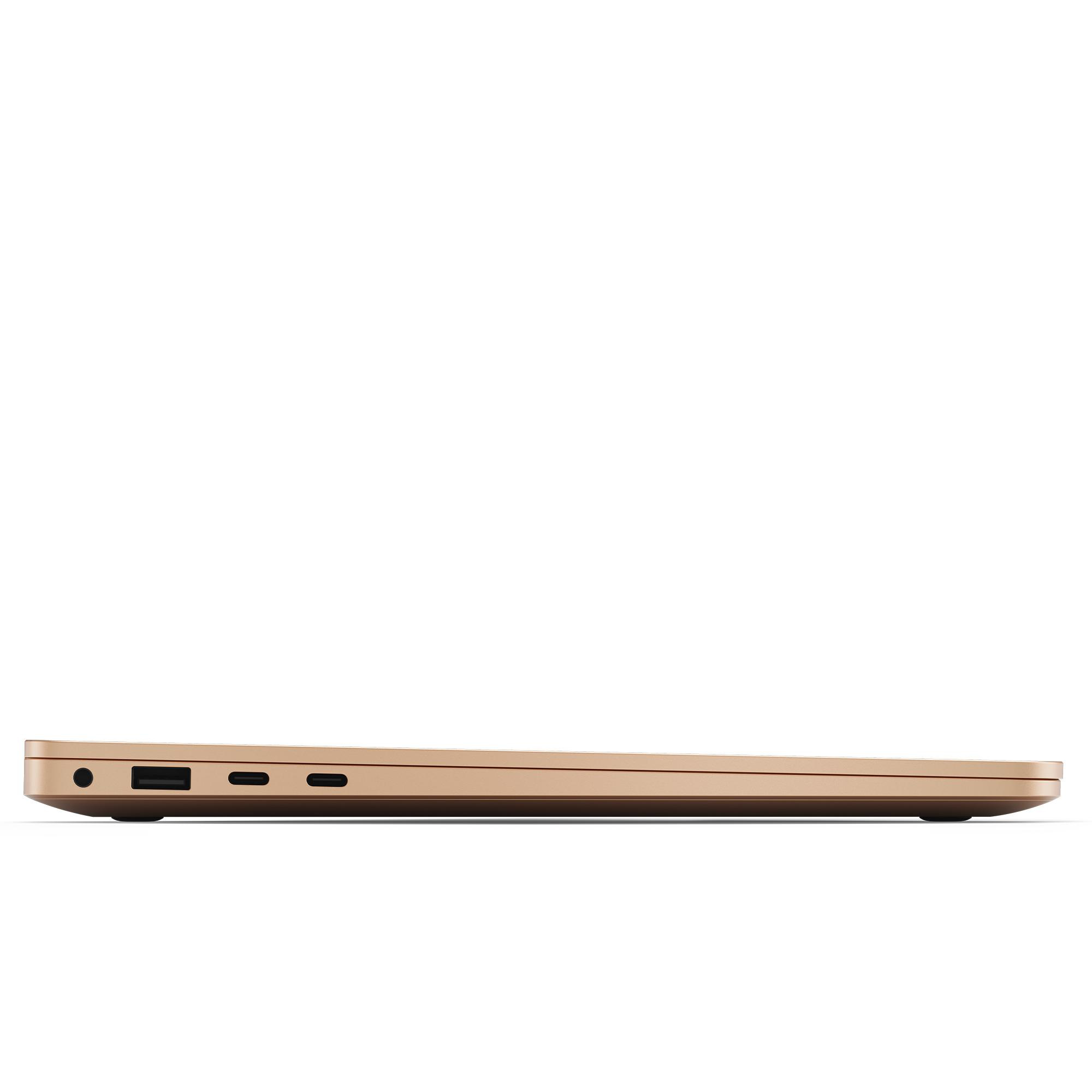 Seitenansicht eines goldenen Laptops mit Anschlüssen auf einer Seite. Klares Design.