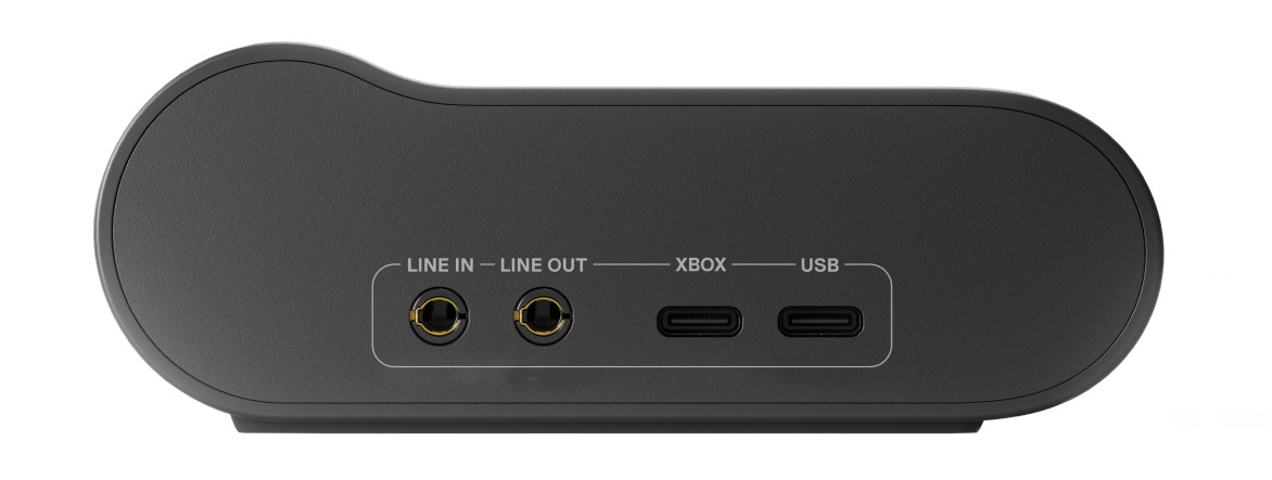 Ciemnoszare urządzenie z portami wejścia/wyjścia liniowego, Xbox i USB. Na białym tle.