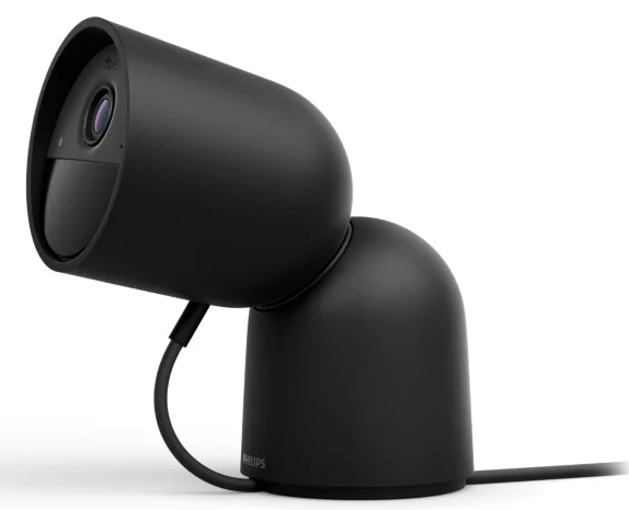 Czarna inteligentna kamera bezpieczeństwa Philips na stojaku, z czarnym przewodem zasilającym.