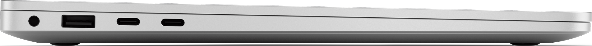 Vista laterale di un laptop grigio chiaro con porte, tra cui USB, e ingresso di alimentazione.