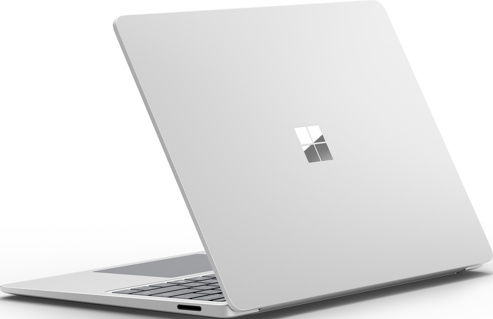 Ein weißer Laptop-Computer, von hinten betrachtet, mit dem Microsoft-Logo.