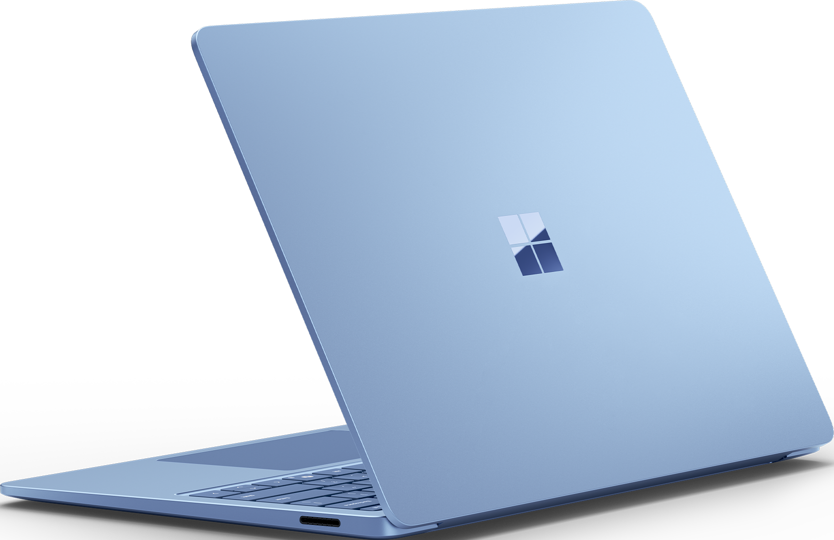 Laptop azzurro, vista posteriore. Logo Microsoft sul coperchio. Sfondo nero.