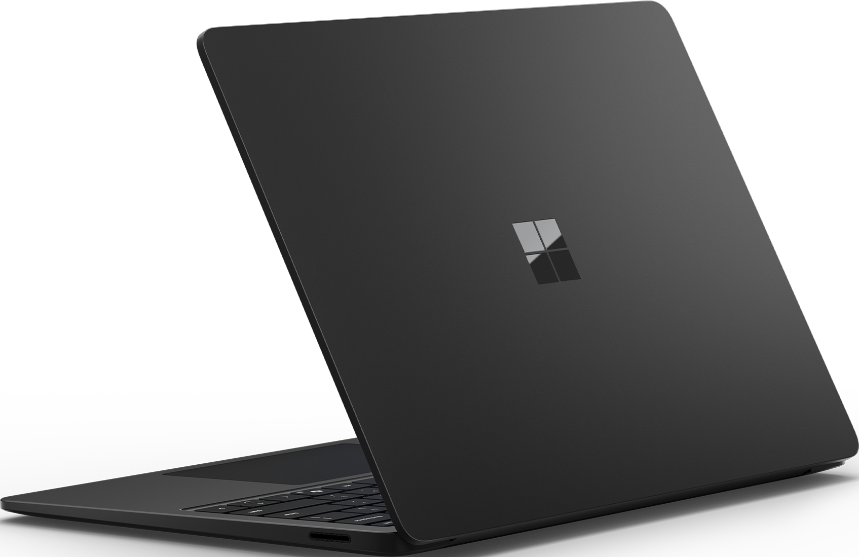 Schwarzer Laptop mit Microsoft-Logo auf der Rückseite, auf schwarzem Hintergrund.