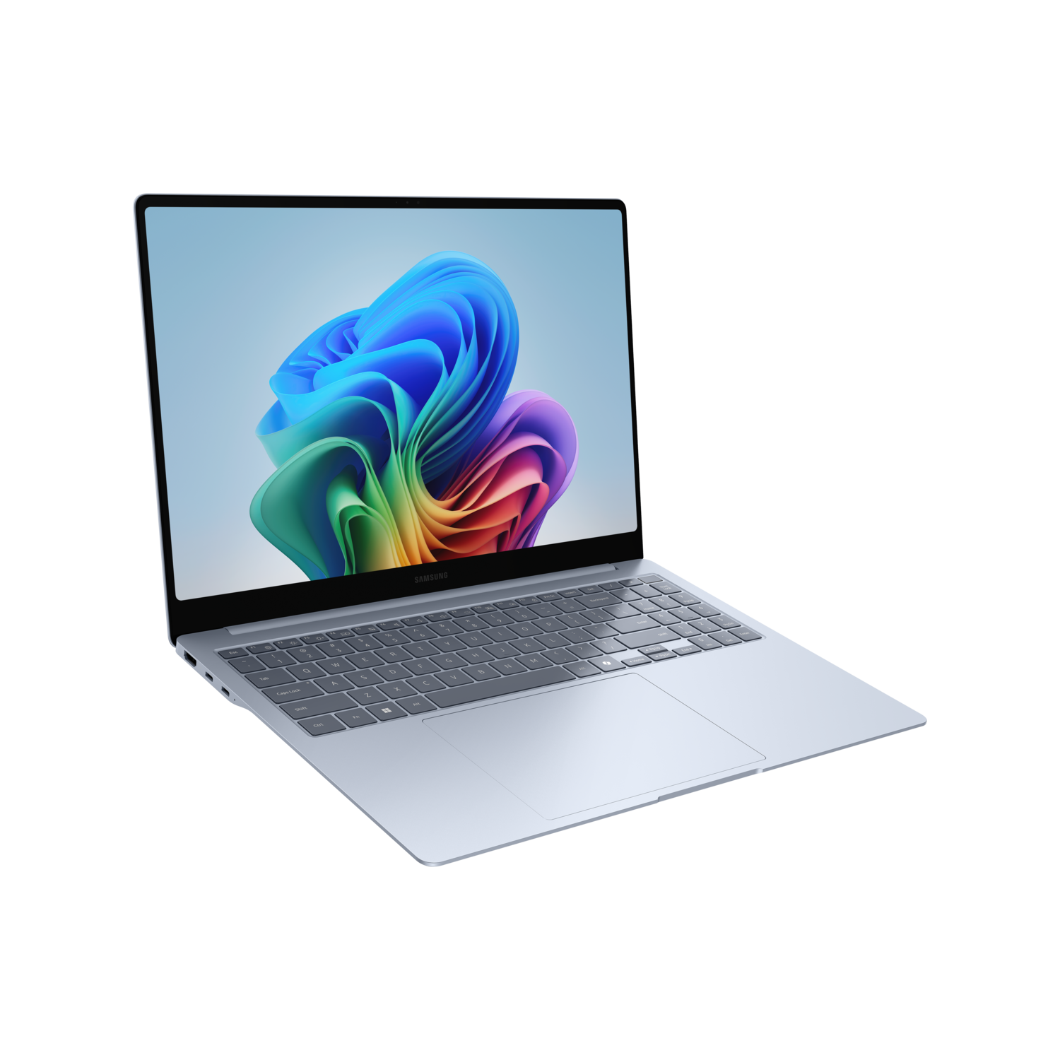 Zilveren laptop op een zwart oppervlak. Het scherm toont een kleurrijk ontwerp.